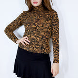 Tiger Stripe Turtleneck on Caramel