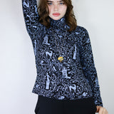 Frost on Black 'Beyond the Gates' Turtleneck