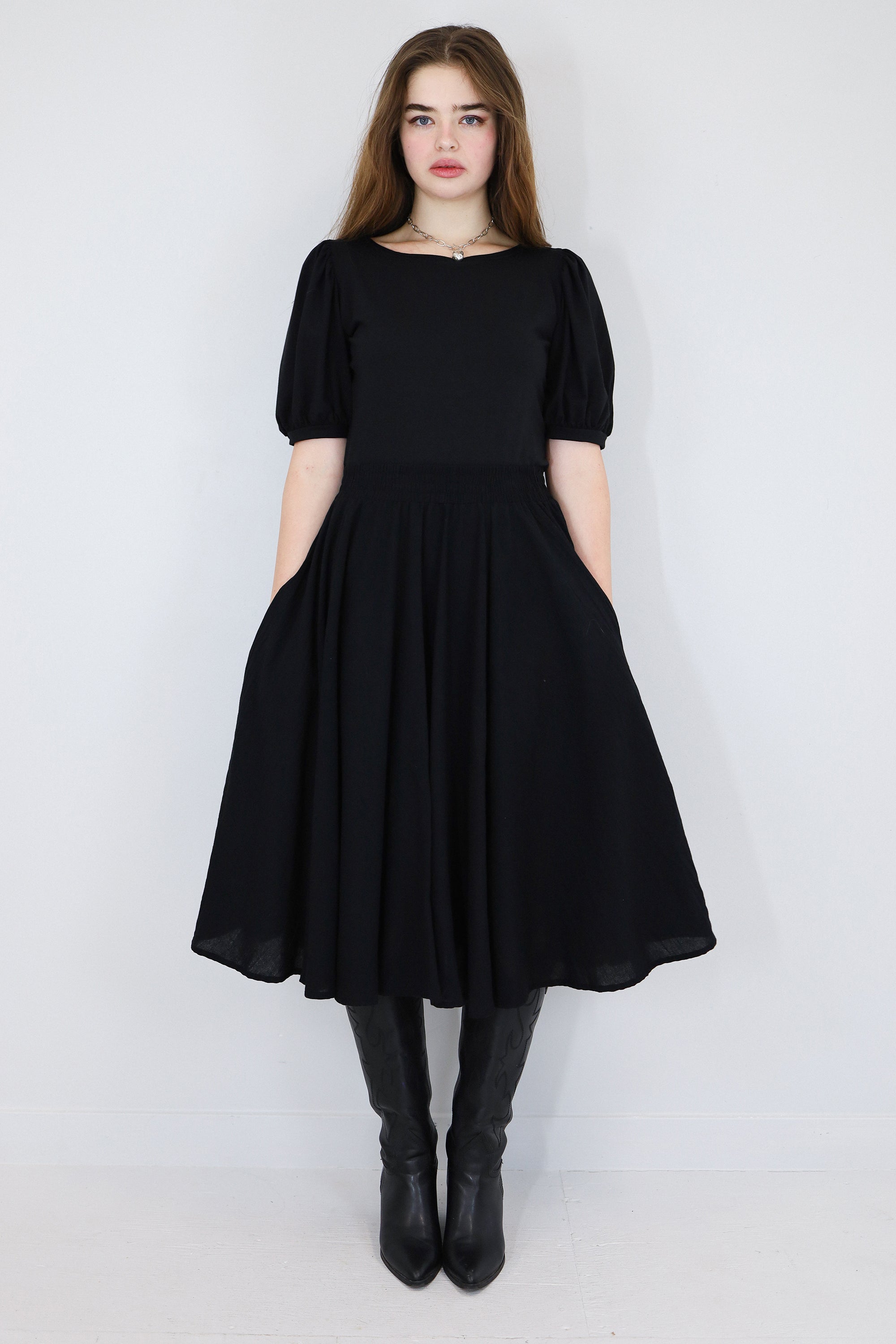 Model wearing a black twirl circle skirt
