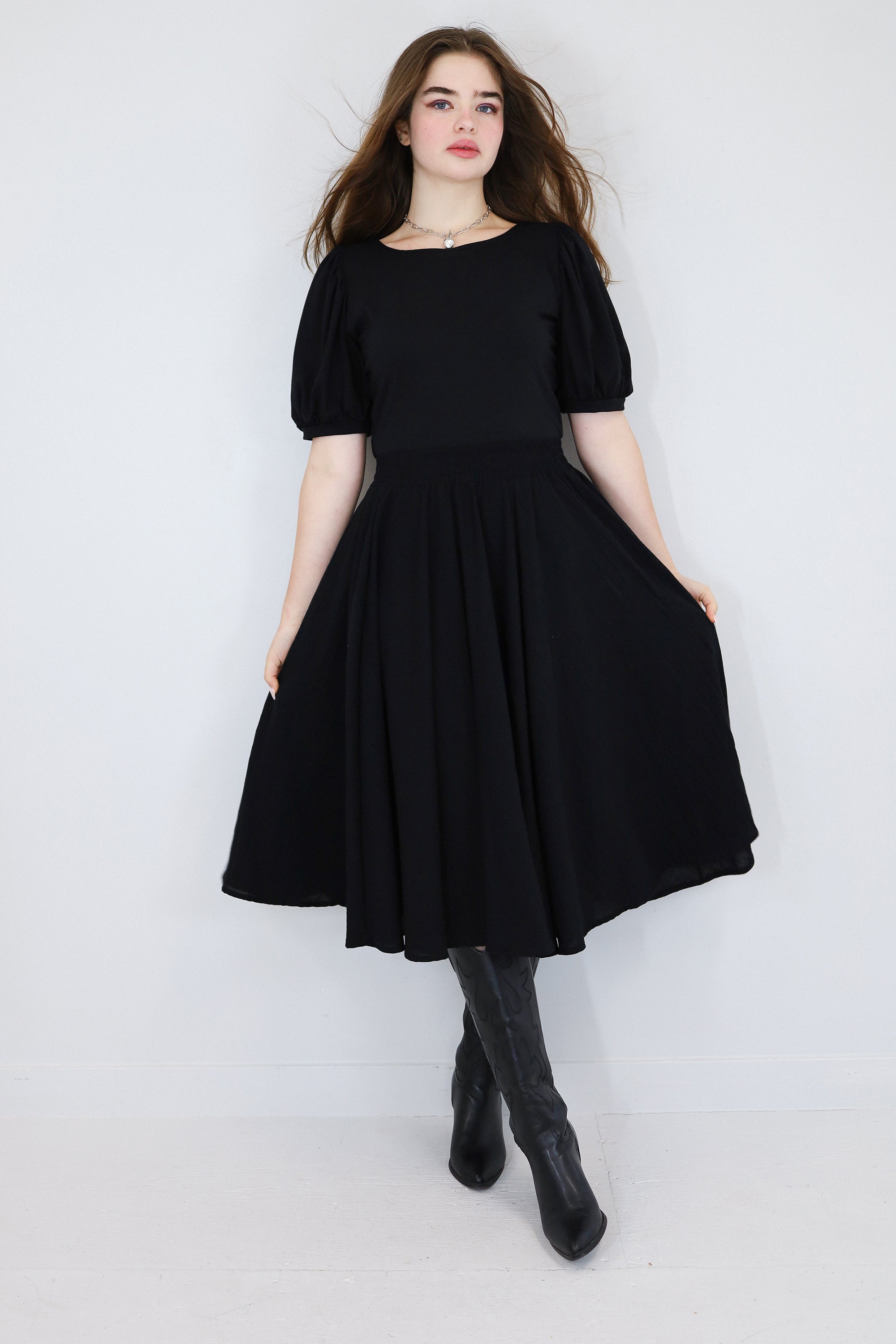 Model wearing a black twirl circle skirt